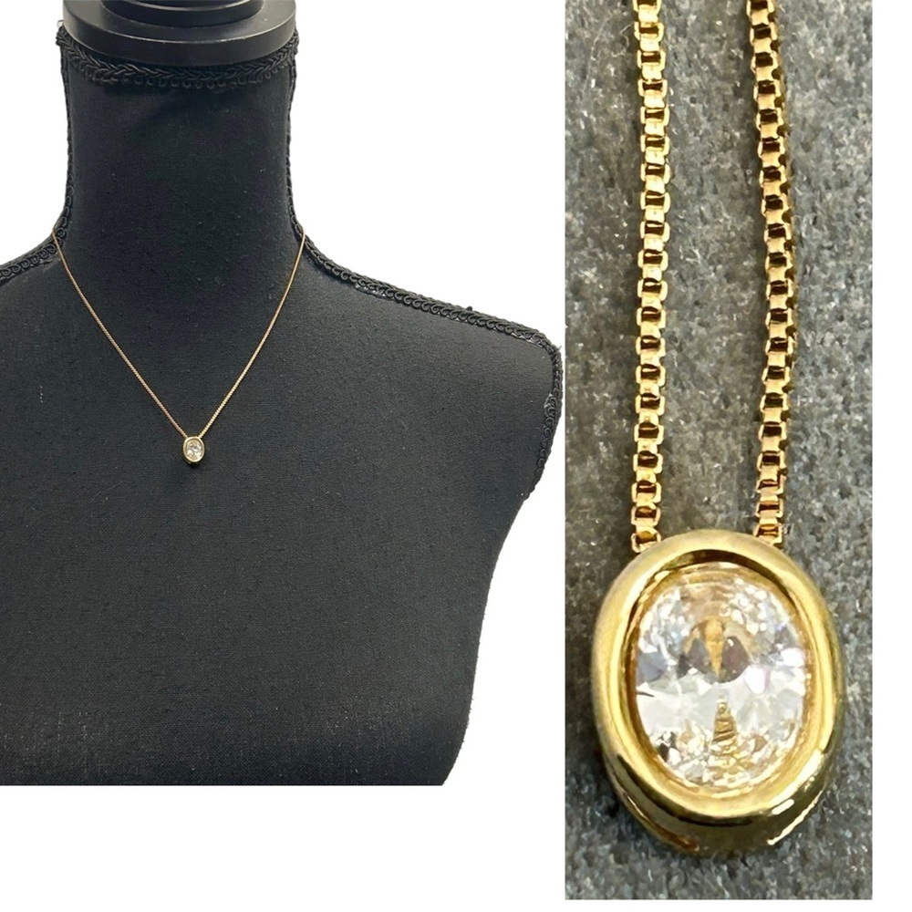 Gold-tone oval crystal rhinestone pendant necklace
